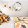 bedroom with colorful bed spreads and a large closet