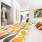 bedroom with colorful bed spreads and a large closet
