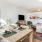 a dining area beside a living room