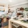 a dining area beside a living room